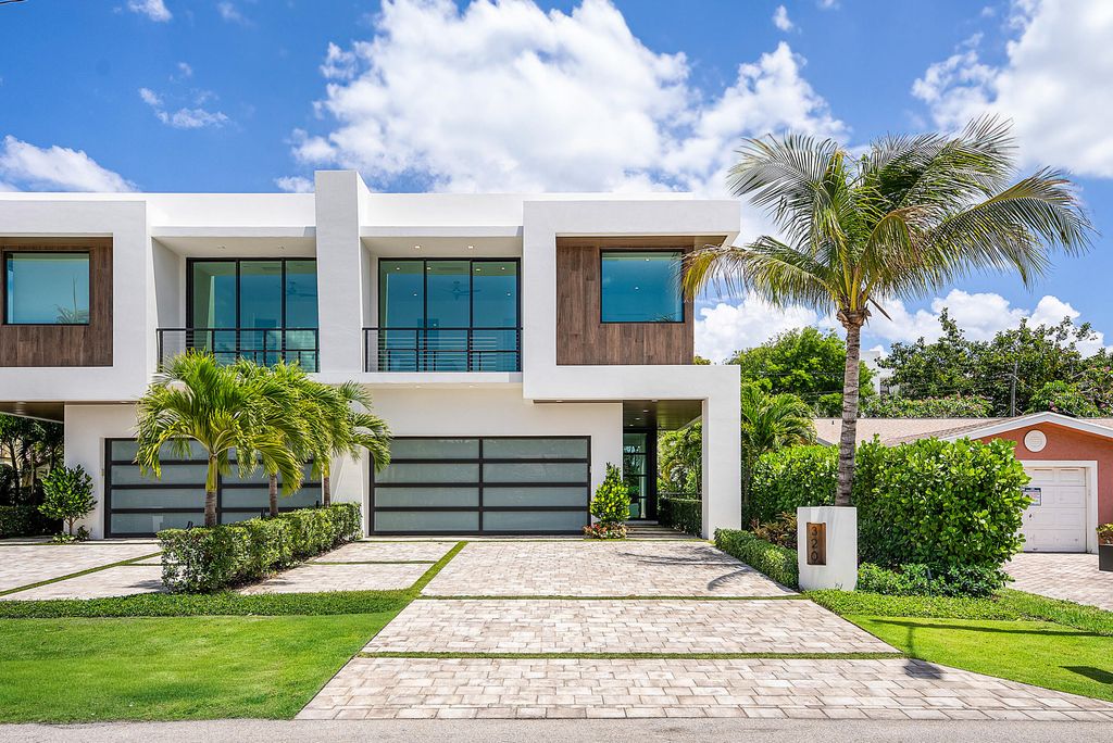 Photo of 320 NE Wavecrest Way, Boca Raton, FL 33432 (MLS # B26025396)