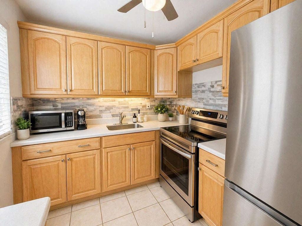 Photo of 1 Canterbury A, West Palm Beach, FL 33417 (MLS # B26014587)
