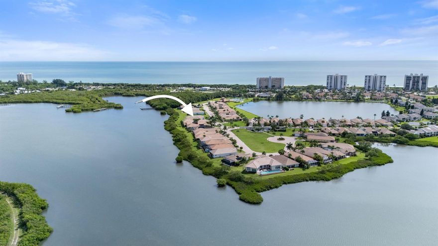 This exceptional, nearly new custom waterfront residence on Hutchinson Island offers all the modern features one would expect in a high-quality home. The welcoming foyer opens to a fantastic family room and gourmet, island kitchen overlooking peaceful Wildcat Cove. The large, screened lanai and patio are great for entertaining or enjoying beautiful sunsets after a long day. Interior features include stainless appliances, quartz countertops, endless cabinets, pantry, luxury vinyl flooring, crown molding, plantation shutters, picture window with push-button shade, energy efficient double pane impact windows, 86 inch television, walk in closet with doorway to laundry room. Exterior features include energy efficient foam insulation, whole house generator, oversized double garage with abundant