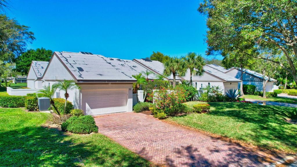 Photo of 35 Clubhouse Lane, Boynton Beach, FL 33436 (MLS # R10962226)