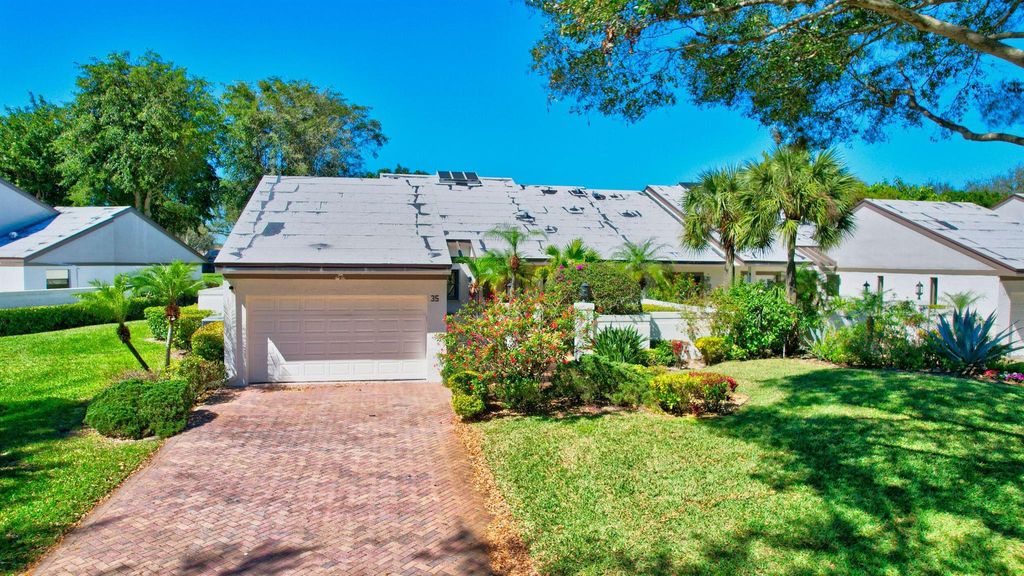 Photo of 35 Clubhouse Lane, Boynton Beach, FL 33436 (MLS # R10962226)