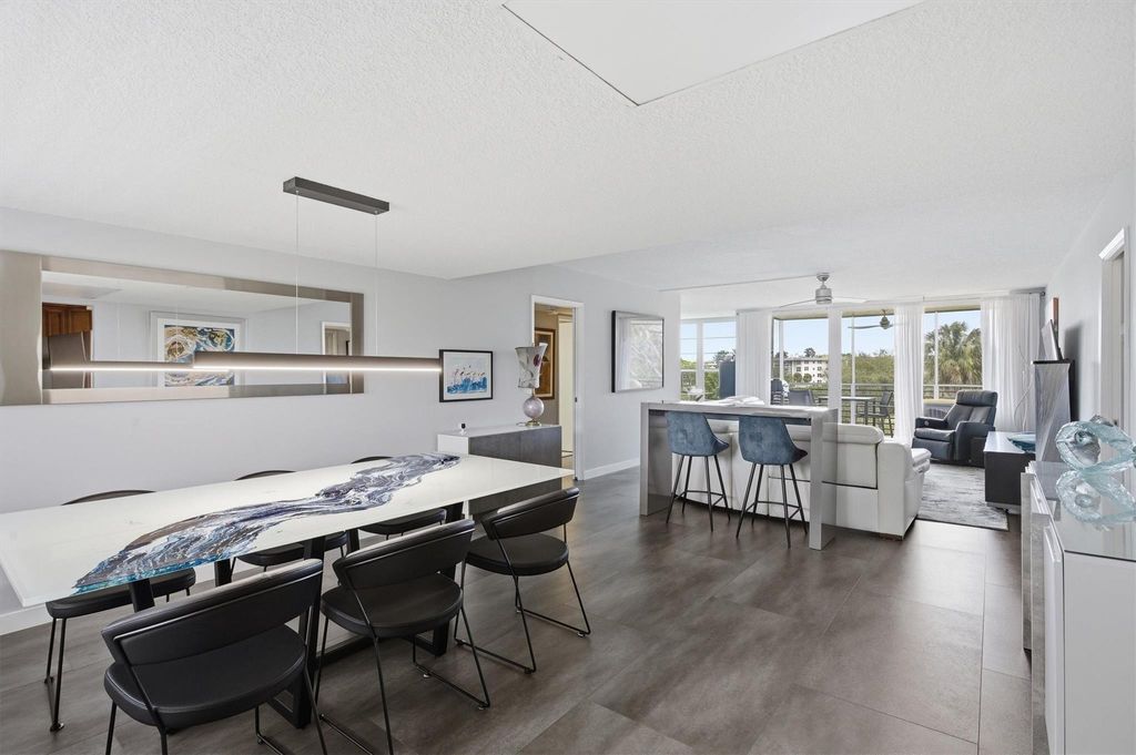 Photo of 3850 Oaks Clubhouse Drive #408, Pompano Beach, FL 33069 (MLS # F10556528)