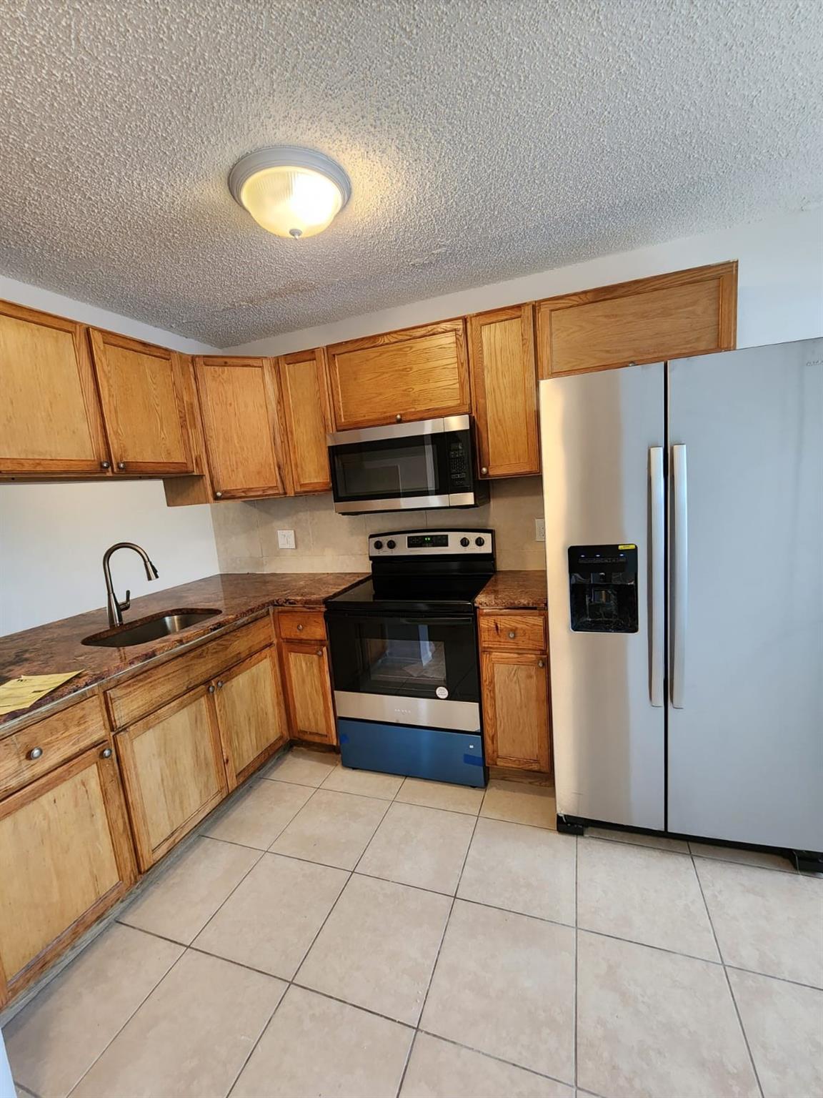 LAKESIDE AT TAMARAC - Residential