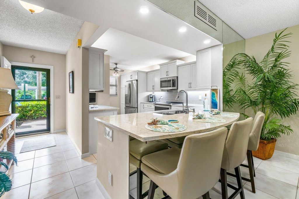 Photo of 300 N Highway A1a #105c, Jupiter, FL 33477 (MLS # R10978505)