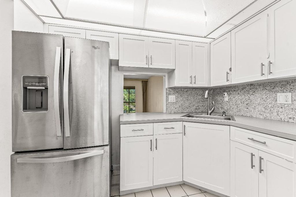 Photo of 5980 NW 64th Avenue #305, Tamarac, FL 33319 (MLS # R11135173)