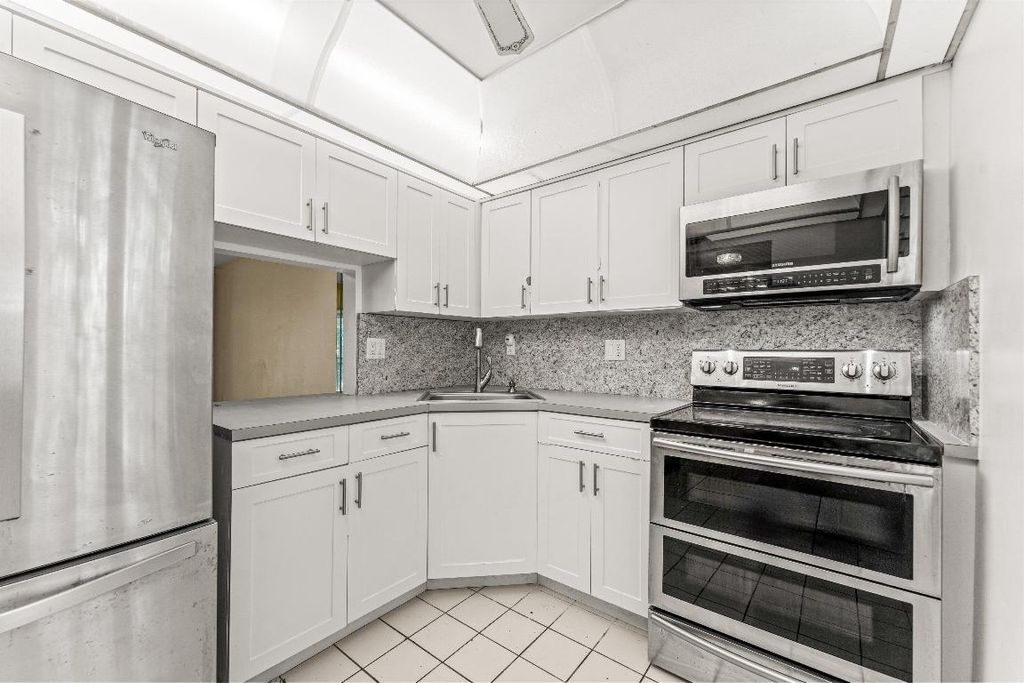 Photo of 5980 NW 64th Avenue #305, Tamarac, FL 33319 (MLS # R11135173)