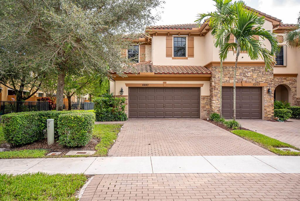 Photo of 10283 Wellington Parc Drive, Wellington, FL 33449 (MLS # R11160205)