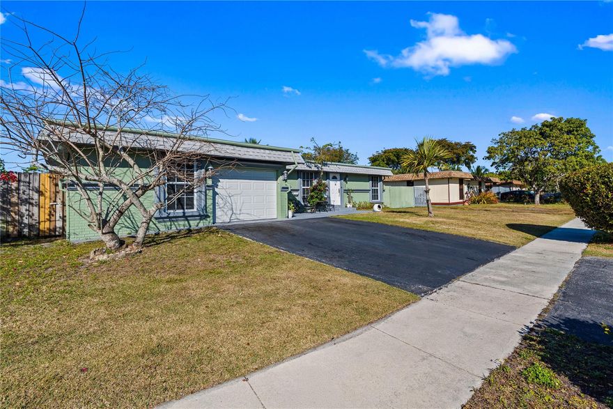 Beautifully and large corner lot, updated 3 bedrooms, 2.5 bathroom house with a large den and a private pool. Must See.