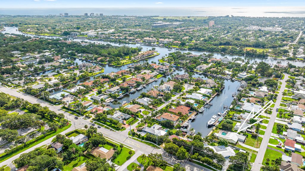 Photo of 2443 Edgewater Drive Dr, Palm Beach Gardens, FL 33410 (MLS # R10813980)