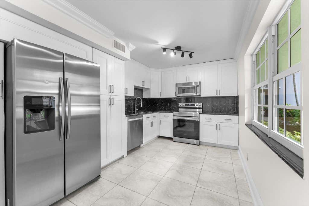 Photo of 4240 OAKS Terrace #103, Pompano Beach, FL 33069 (MLS # B26056413)