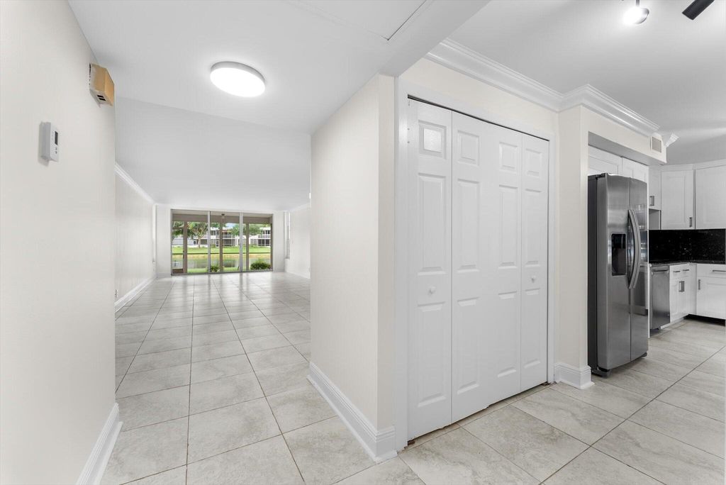 Photo of 4240 OAKS Terrace #103, Pompano Beach, FL 33069 (MLS # B26056413)