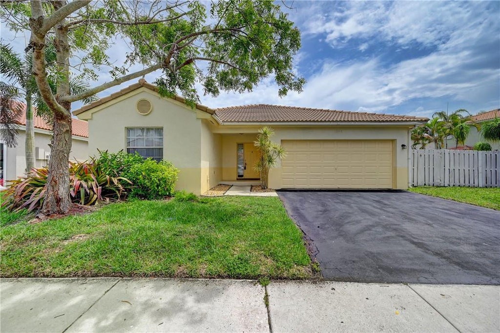 Photo of 13348 NW 13TH Street, Sunrise, FL 33323 (MLS # B26083940)