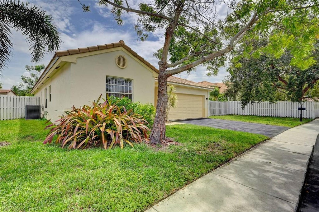 Photo of 13348 NW 13TH Street, Sunrise, FL 33323 (MLS # B26083940)