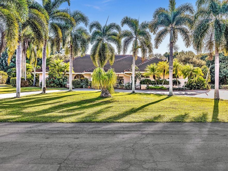 PRICE ADJUSTMENT SELLERS ENTERTAING ALL OFFERS. NO HOA 1 ACRE  3,562 SQFT UNDER AC+- 2 BAY ATTACHED GARAGE  FREE STANDING  3 BAY GARAGE 1,078 sq ft +-,  POOL SPA PATIO  CIRCLE  DRIVEWAY  CUL DE SAC ST  HORSES WELCOME Double front doors opens to foyer. Office or 4th bedrm to the left to the right is the dining area 6 sets of French doors open to patio pool area. Split bedrms. Master bedrm featuring a lounging area. 2 walk-in cedar closets, dressing area Roman tub, step-in shower Enclosed toilet + bidet. Kitchen: snack bar, breakfast area, Brick walls, wood cabinets,granite counters,walk-in pantry. Plenty of counter space,built-in appliances. Utility rm Family rm adjoins kitchen features a brick fireplace 3 AC units Roof 2009 Ideally located to major thoroughfares  minutes to Ft Laud Airport