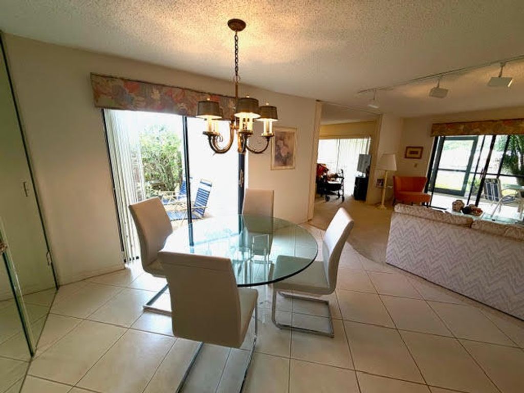 Photo of 10 Southport Lane #A, Boynton Beach, FL 33436 (MLS # B26012307)