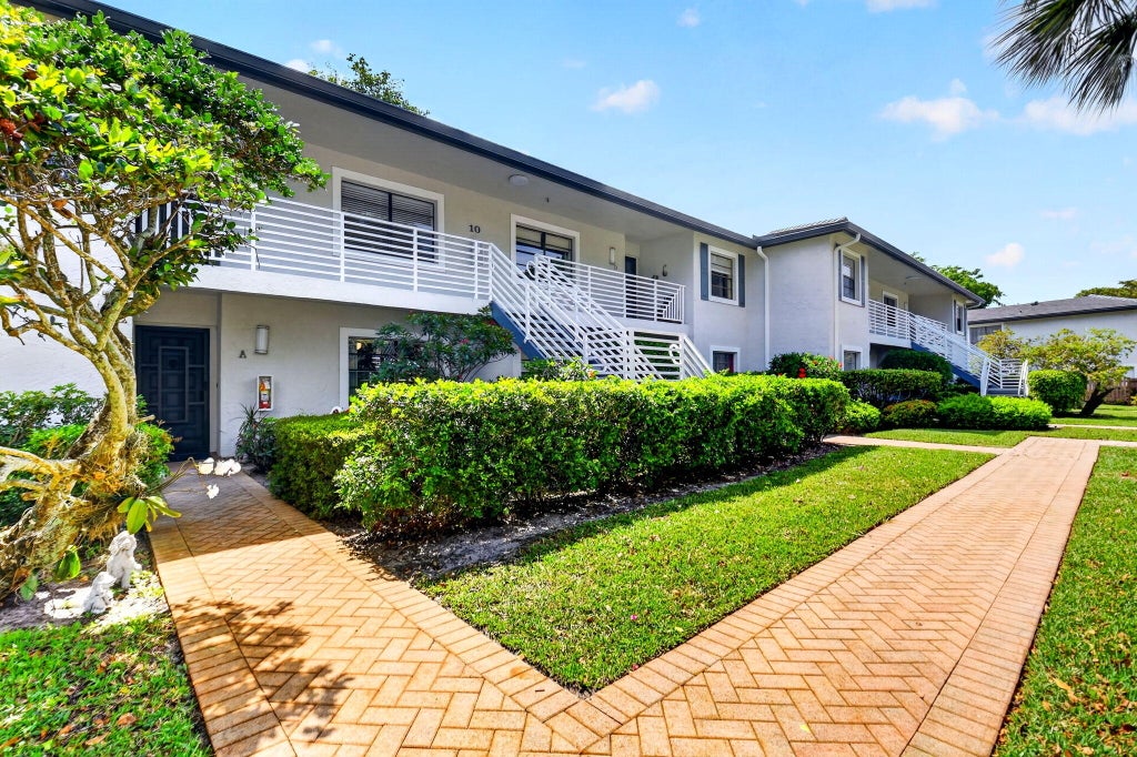 Photo of 10 Southport Lane #A, Boynton Beach, FL 33436 (MLS # B26012307)