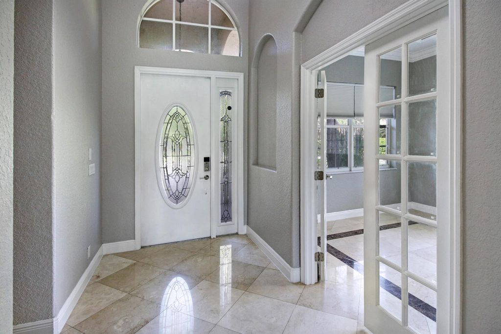 Photo of 12370 NW 78th Manor, Parkland, FL 33076 (MLS # R11089036)