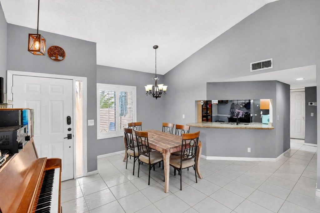 Photo of 14 VIA DE CASAS SUR #104, Boynton Beach, FL 33426 (MLS # B26081852)