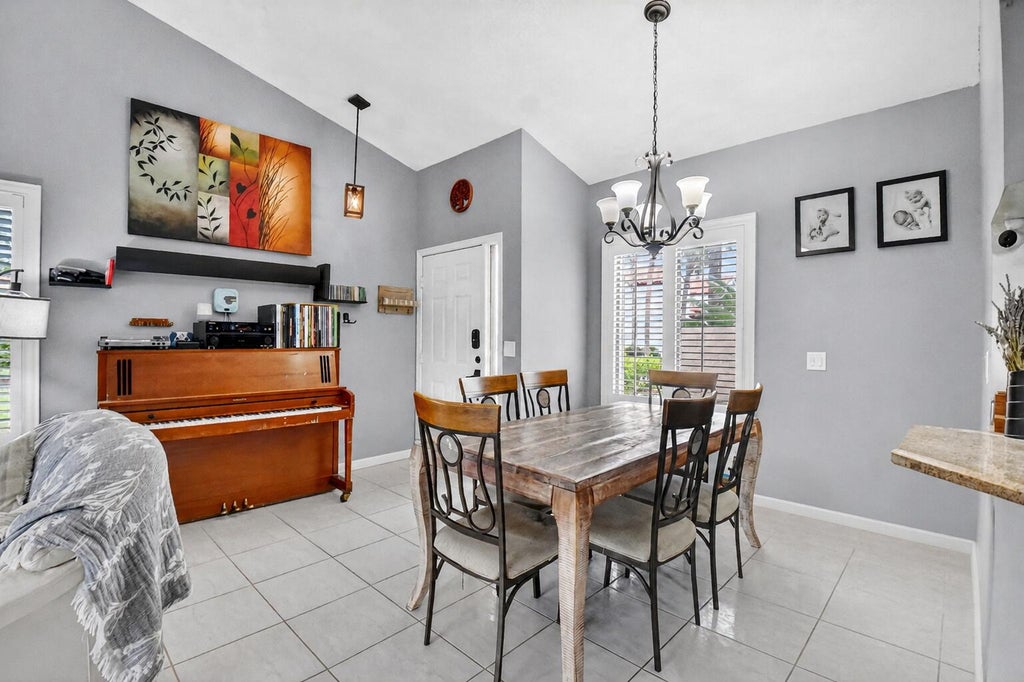 Photo of 14 VIA DE CASAS SUR #104, Boynton Beach, FL 33426 (MLS # B26081852)