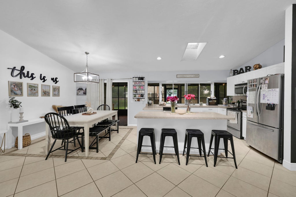 Photo of 967 SW Sultan Drive, Port Saint Lucie, FL 34953 (MLS # B26077160)