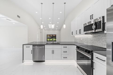 Photo of 6371 Kings Gate Circle, Delray Beach, FL 33484 (MLS # B26026592)