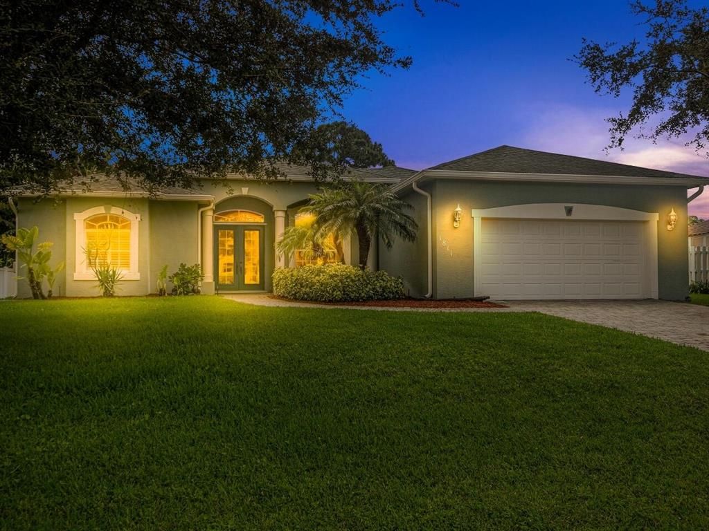 Photo of 1811 SW Mackenzie Street, Port Saint Lucie, FL 34953 (MLS # R10738585)