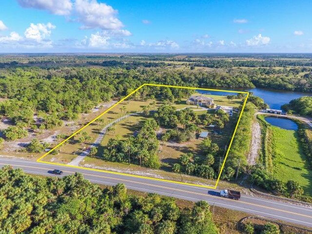 Photo of 11733 SW Citrus Boulevard, Palm City, FL 34990 (MLS # R11079608)