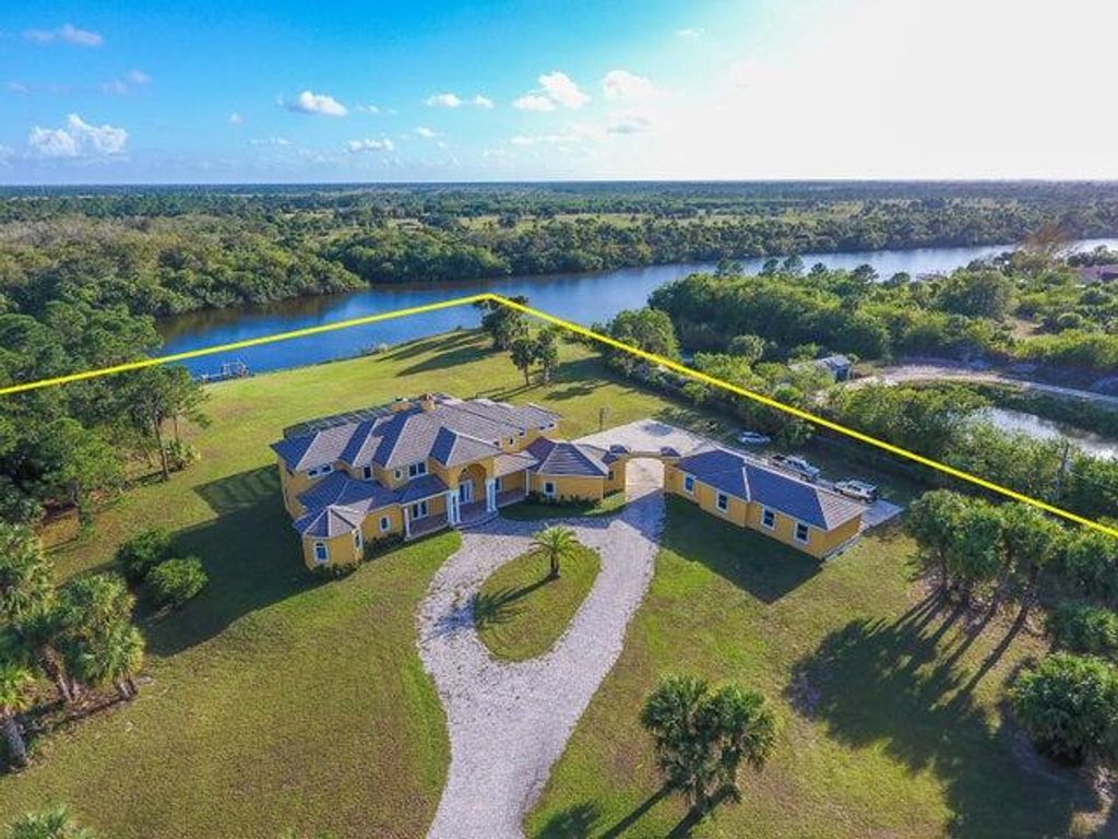 Photo of 11733 SW Citrus Boulevard, Palm City, FL 34990 (MLS # R11079608)