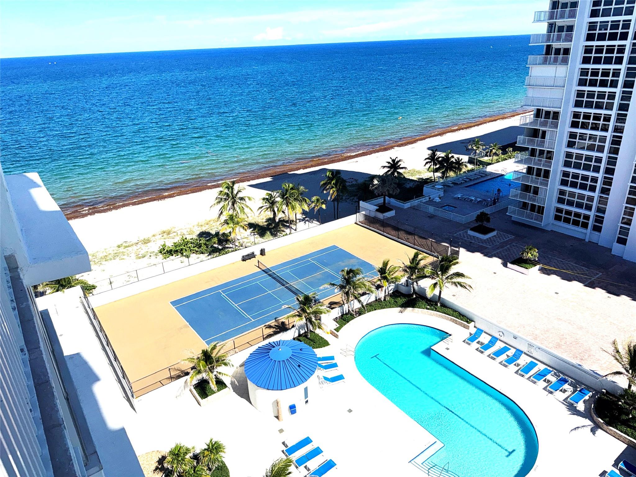 Completely renovated and updated unit on the South side of the building. Beautiful views of the ocean & pool area, away from the construction site. Plenty of closet space with washer/dryer inside the unit. Total size of the unit, including balcony, is 1,676 sq ft. Guest bedroom can also be used as Florida room or extension of living room. 24 hour security and inhouse property manager. Amenities includes pool, spa, sauna, BBQ deck, tennis court, fitness center, private beach, library, garage, ballroom, sky lounge and 24 hour doorman. Next to the new Ritz Carlton and Waldorf Astoria Resorts. Short walk to Pompano Beach Pier; just 13 miles to Ft Lauderdale Airport. Luxurious beach lifestyle without breaking the bank. Available for yearly rental only; no short term rental.