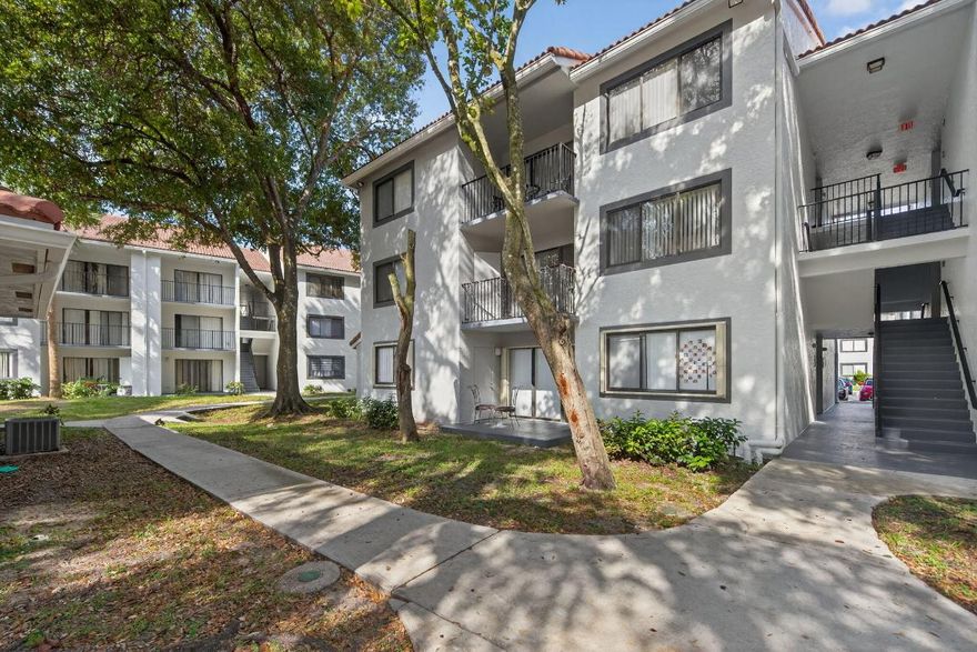 This top-floor 2/2 condo offers a light and bright space with volume ceilings. The open-concept living and dining area is filled with natural light, creating a comfortable space for both everyday living and entertaining. A split floor plan enhances privacy, while the primary suite features a walk-in closet and ensuite bath. This residence also includes a full-size washer and dryer conveniently located in the unit. Enjoy outdoor living on the covered patio, complete with a private storage room and views of the garden and pool. Located within a gated community, residents have access to a variety of amenities including pools, a fitness center, tennis court, playground, and car wash area. Please note select photos have been virtually staged to better showcase the true potential of the unit. Residents of Visconti enjoy living within walking distance to Ramblewood Middle School and also in close proximity to other excellent public and private schools. Coral Springs offers the perfect balance of peaceful suburban living and small town charm with the convenience of urban amenities, making it one of South Florida's most desirable areas to live with a variety of new development and hotspots popping up all over town offering new & trendy shops and dining spots like Tacocraft Taqueria & Tequila Bar, The Cook & The Cork, Eddie & Vinny's Coastal Italian just opened serving up innovative menus adding to a growing culinary scene as well as local long standing favorites Pizza Time, Big Bear Brewing Co and Bonefish Grill. The city is also home to cultural experiences such as the Coral Springs Center for the Arts, where residents can enjoy live performances, concerts and theater. There are also numerous parks and sports complexes, including the Betti Stradling Park, The Sportsplex at Coral Springs, home to the Florida Panthers Ice Den, offers an aquatic center, tennis courts and even a nature center. Don't miss your opportunity to own this gem and experience the best of South Florida living - - Schedule a showing today!