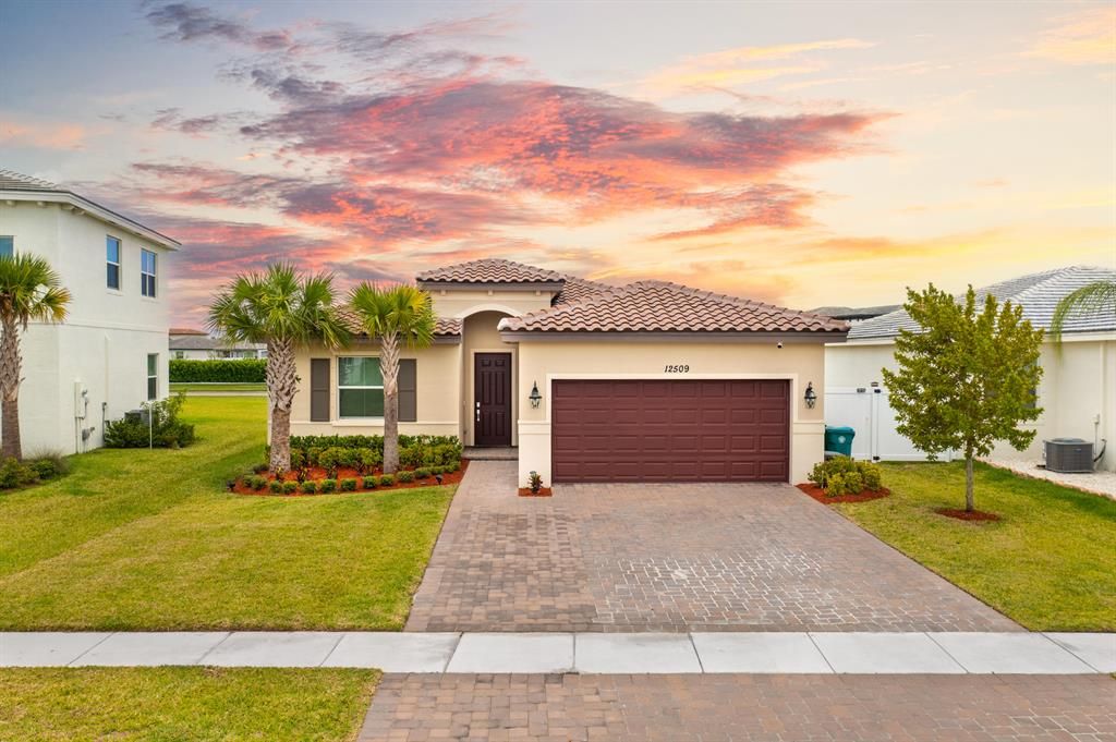Photo of 12509 NW Lynch Lane, Port St Lucie, FL 34987 (MLS # R10891219)