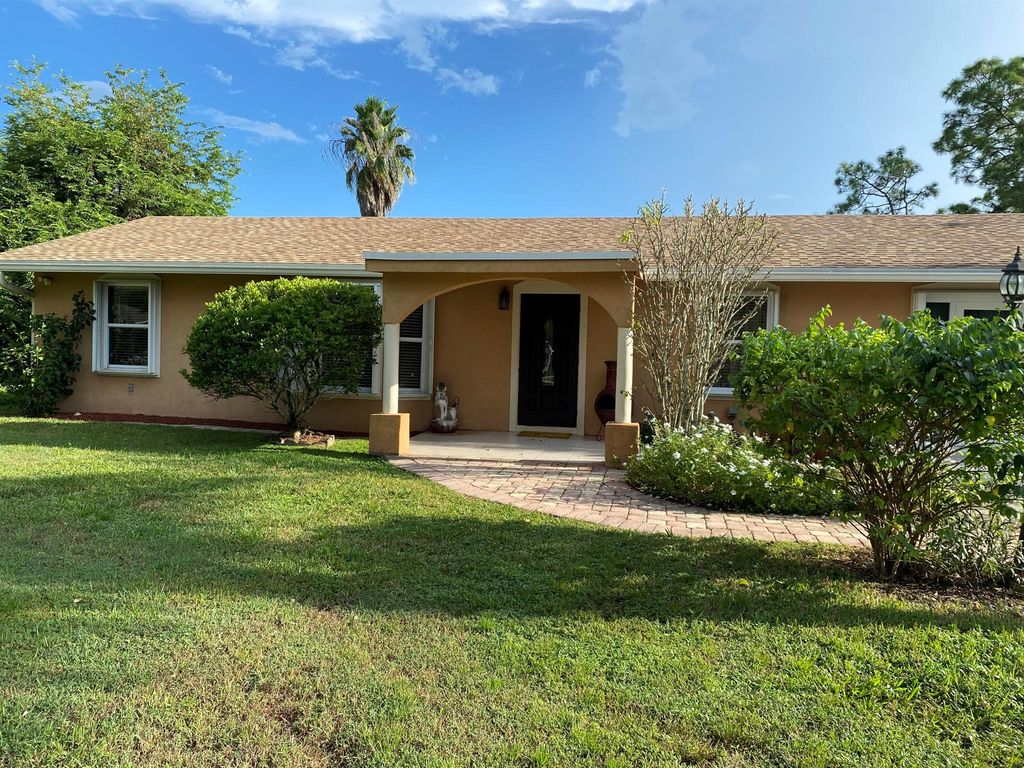 Photo of 13216 Orange Boulevard N, The Acreage, FL 33412 (MLS # R10906330)