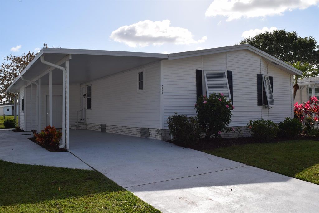 Photo of 2948 Fiddlewood Circle, Port Saint Lucie, FL 34952 (MLS # R10968082)