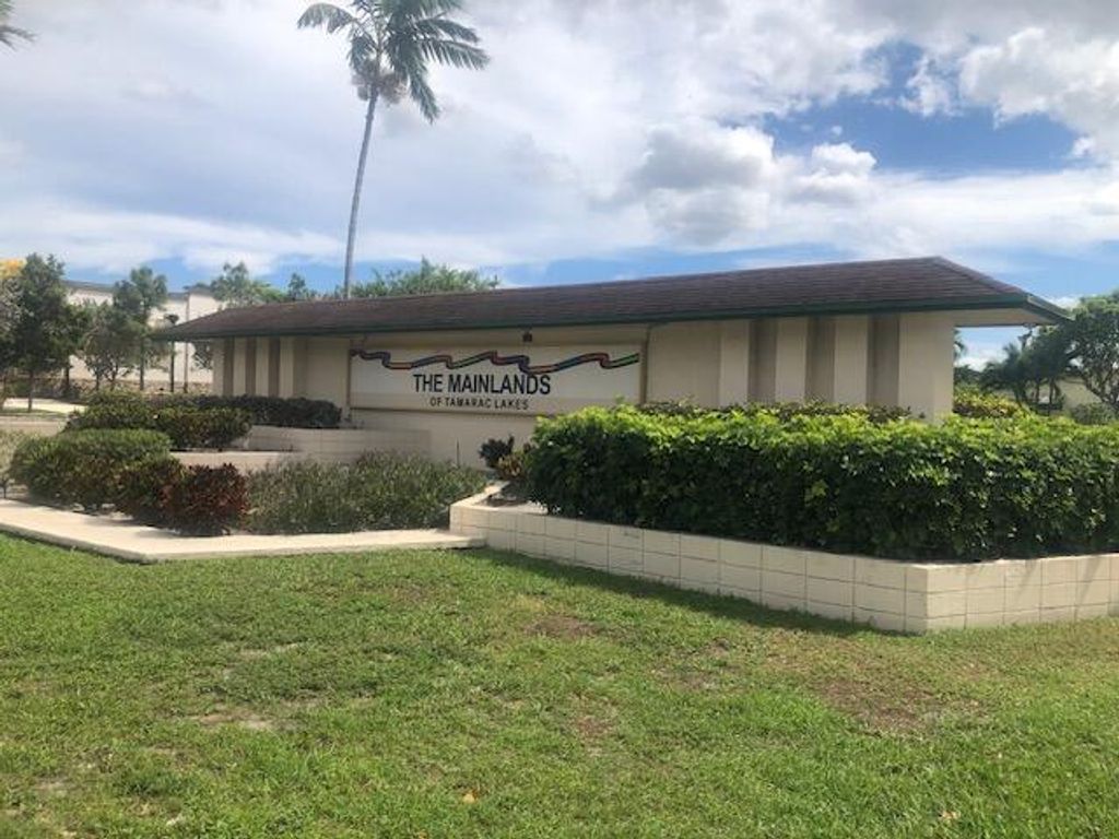 Photo of 4504 NW 43rd Terrace, Tamarac, FL 33319 (MLS # B26005117)