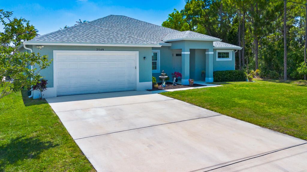 Photo of 2549 SE Lyman Circle, Port Saint Lucie, FL 34952 (MLS # B26027119)