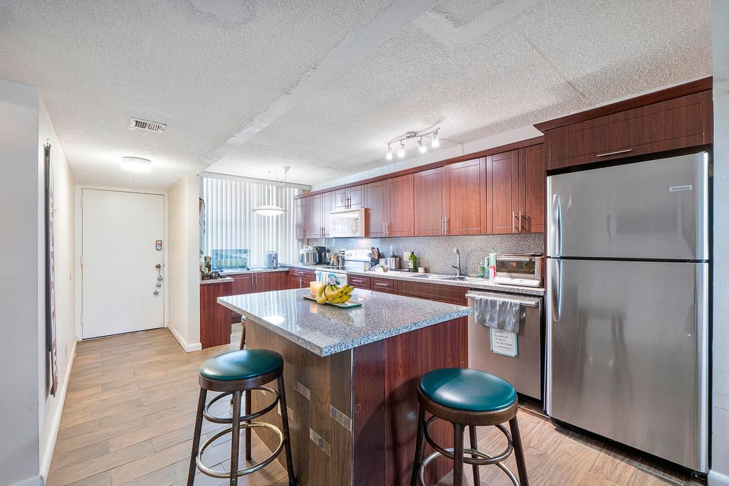 Photo of 250 Jacaranda Drive #308, Plantation, FL 33324 (MLS # B26029997)