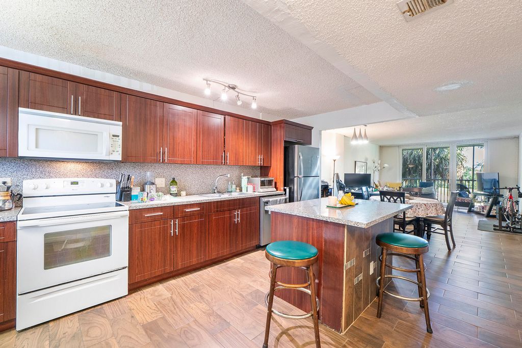 Photo of 250 Jacaranda Drive #308, Plantation, FL 33324 (MLS # B26029997)