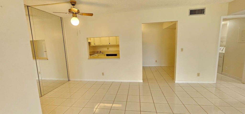 Photo of 825 Sky Pine Way #G1, Greenacres, FL 33415 (MLS # R11086829)