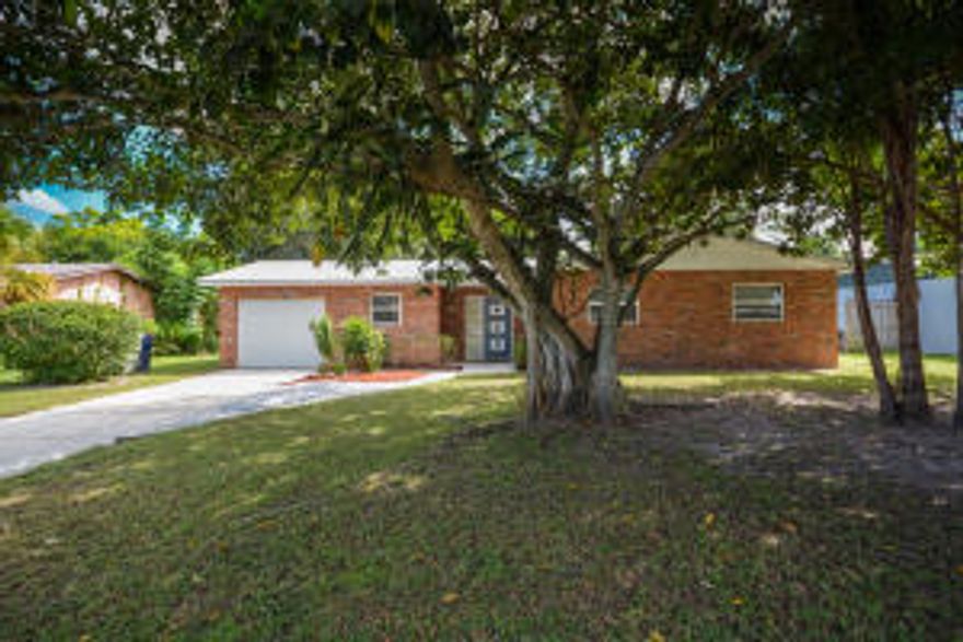 Beautifully Remodeled 3/2/1 Home in the Heart of STUART(2016 Happiest Seaside Towns in America). This home is Immaculate and turn key, just back the truck up and move on in! Home has many great features such as: NEW Flooring, NEW Kitchen with Granite Countertops and 42'' Cabinets, NEW Stainless Appliances,  NEW Trane A/C, NEW State of the Art Washer & Dryer, NEW Metal Roof, Impact Glass Windows,NEW Window Treatments, Crown Moldings, City Water & Sewer and much more! Great starter home for first time buyers. FHA/VA Welcomed! Home walking distance to local schools, close to beaches and the downtown area.....Hurry This Wont last!!!