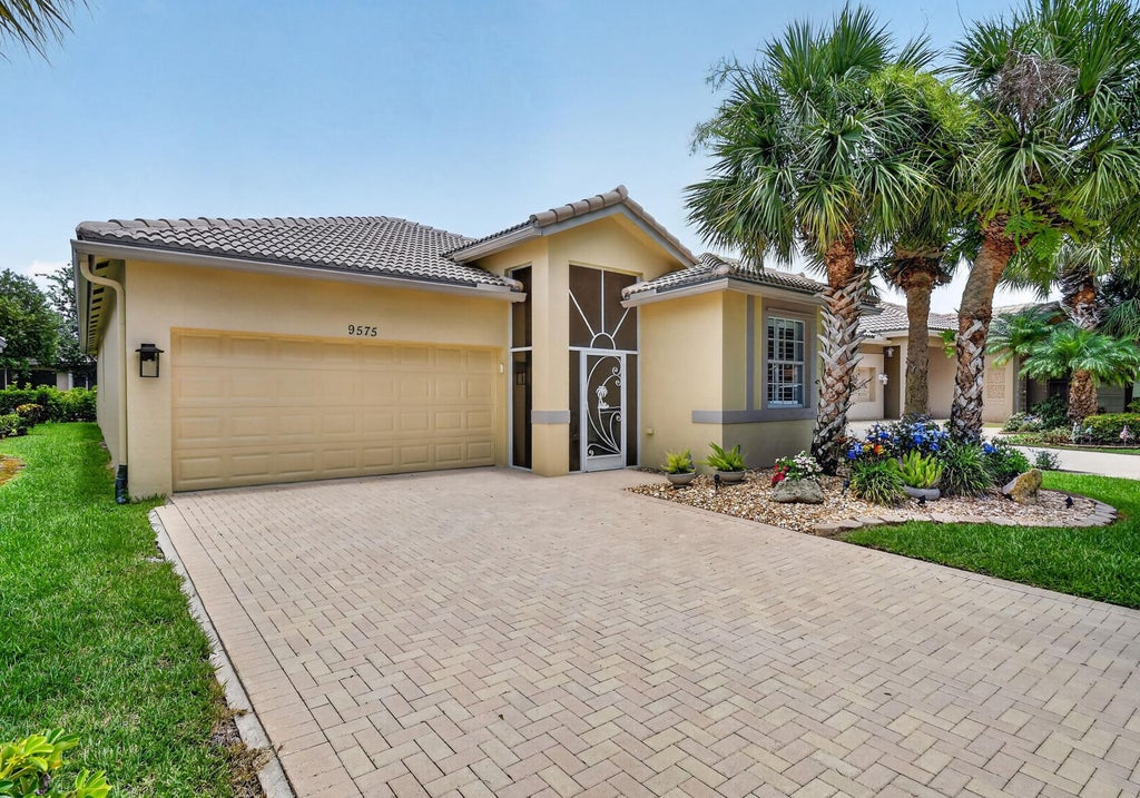 Photo of 9575 Sandpiper Shores Way, West Palm Beach, FL 33411 (MLS # B26050748)