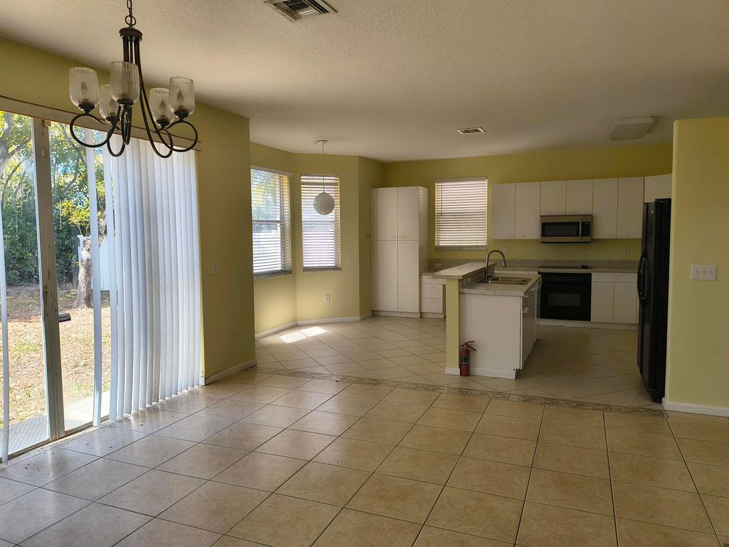 Photo of 1575 Briar Oak Drive, Royal Palm Beach, FL 33411 (MLS # R11162246)
