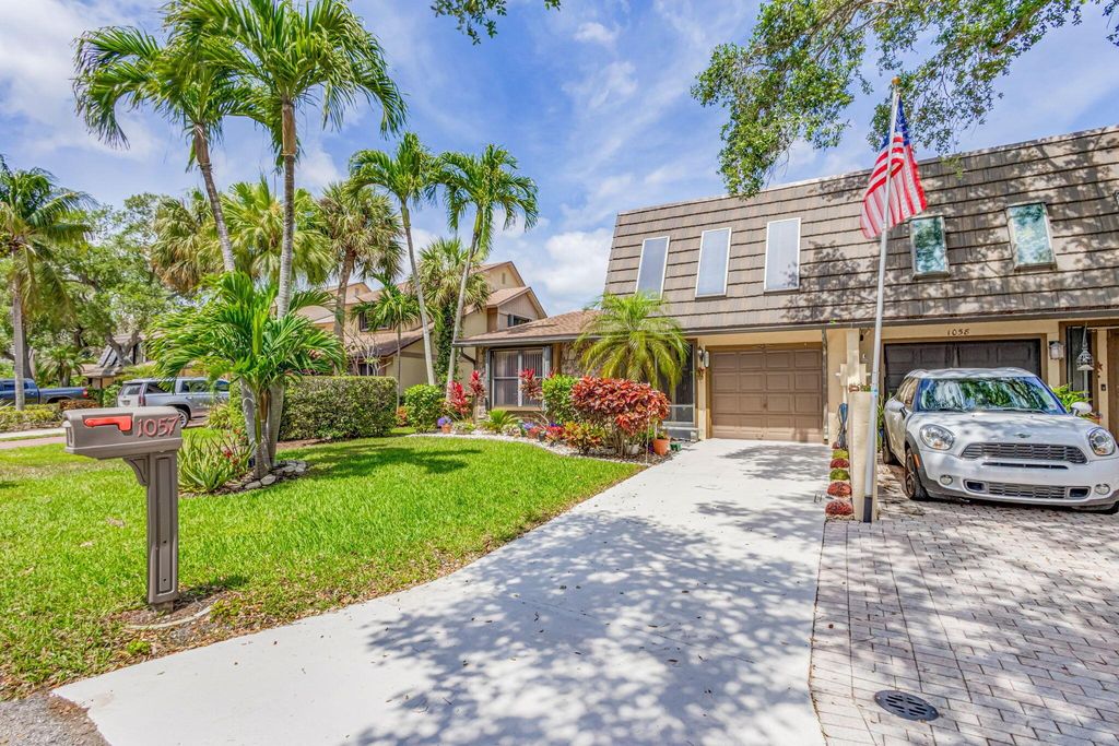 Photo of 1057 Raintree Drive, Palm Beach Gardens, FL 33410 (MLS # R10973429)