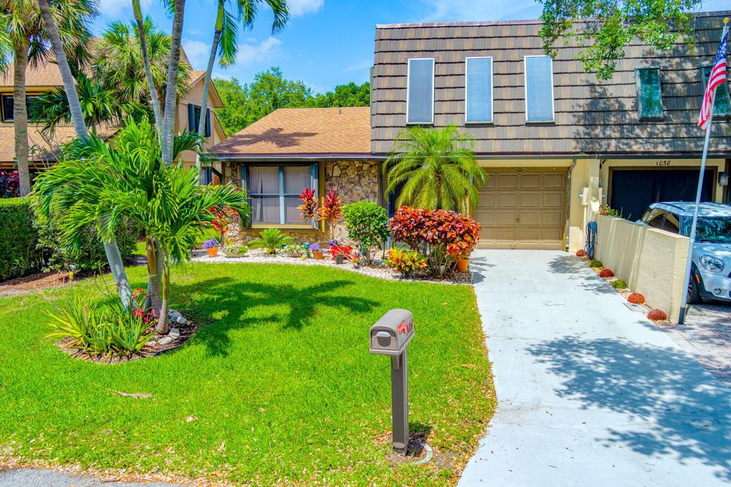 Photo of 1057 Raintree Drive, Palm Beach Gardens, FL 33410 (MLS # R10973429)