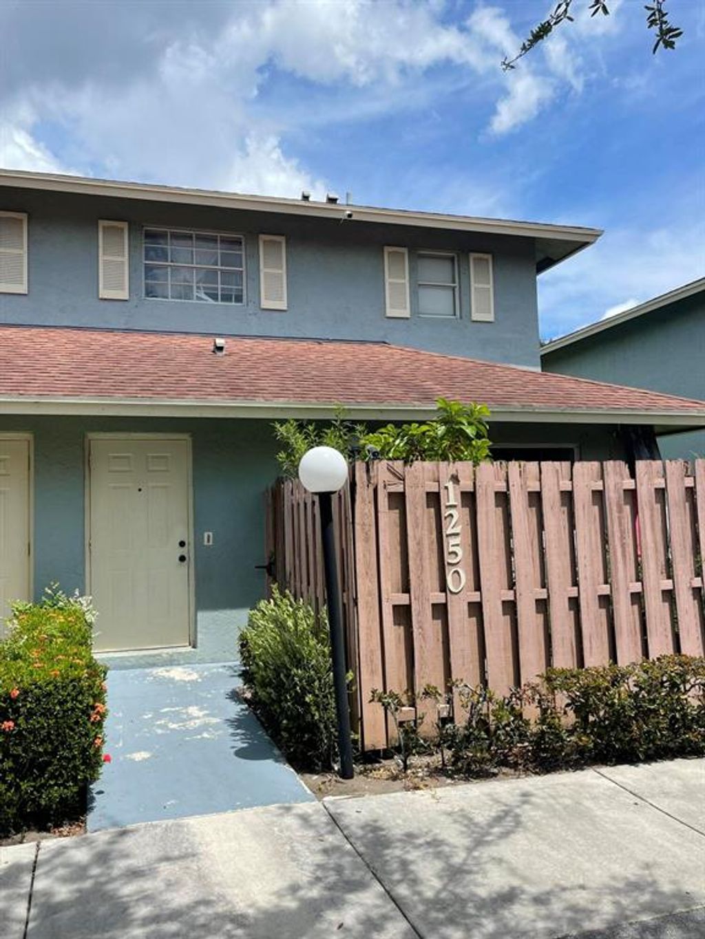 Photo of 1250 Cypress Way Way E, Palm Springs, FL 33406 (MLS # R10830068)