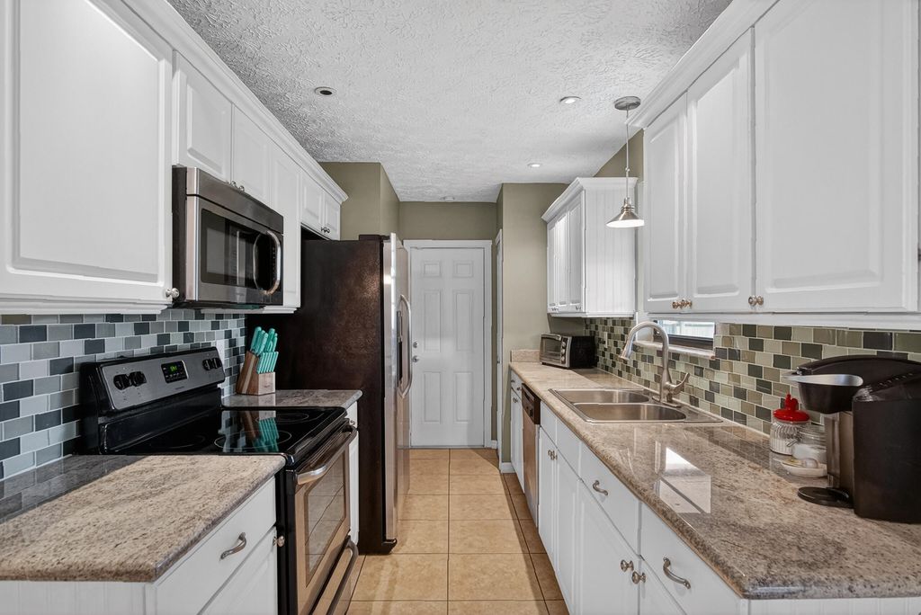 Photo of 2068 SW Morelia Lane, Port Saint Lucie, FL 34953 (MLS # B26006894)