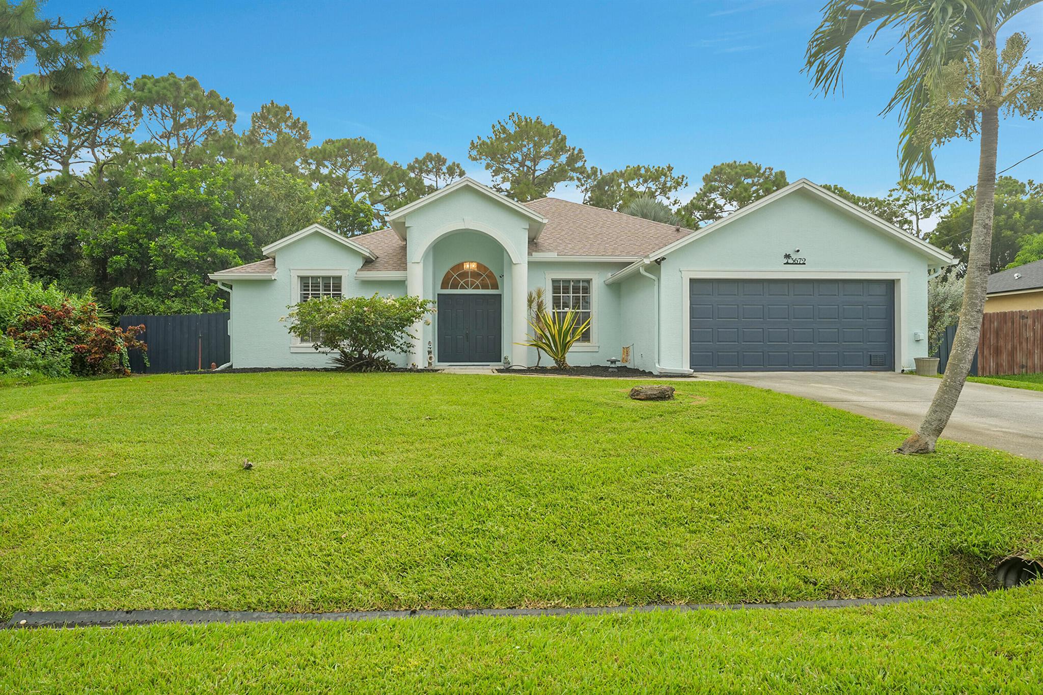 Meticulously maintained and thoughtfully updated, this 3 bed, 2 bath CBS home with a den offers 2,004 sq. ft. of stylish living space. Built in 2004, it features a 2023 roof, volume ceilings, and elegant wood-like tile flooring throughout. The kitchen boasts newer granite counters, 42 inch wood cabinetry, stainless steel appliances, a 2024 garbage disposal, double oven, 2023 microwave and dish washer. You'll also enjoy the newly built (2024) built-in coffee bar with wine fridge- perfect for morning lattes and evening entertaining. This split floor plan includes a guest cabana bathroom that leads to your outdoor oasis. The spacious primary suite includes a tray ceiling with a walk-in closet and additional closet space.