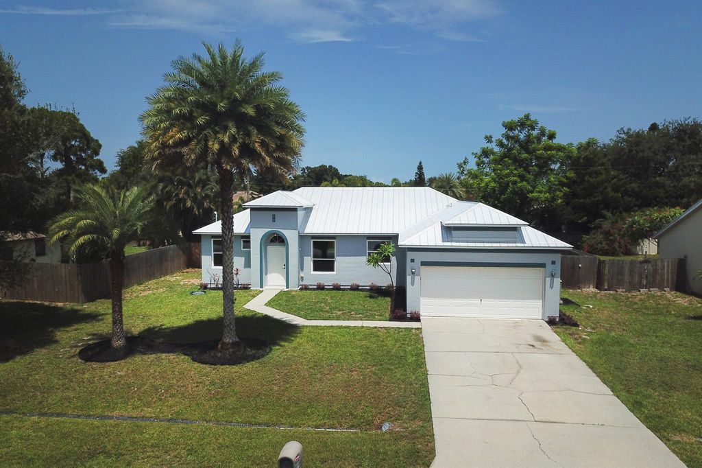 Photo of 1731 SE Ridgewood Street, Port Saint Lucie, FL 34952 (MLS # R11097444)