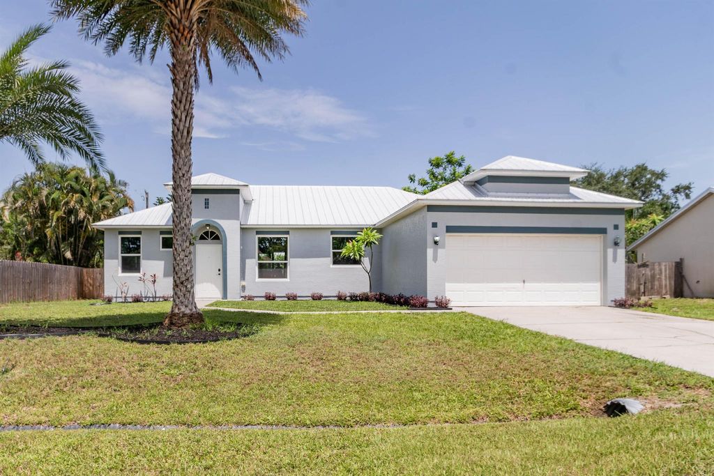 Photo of 1731 SE Ridgewood Street, Port Saint Lucie, FL 34952 (MLS # R11097444)