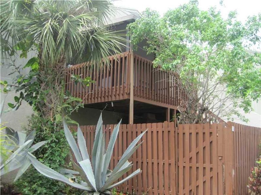 Great Quiet Community. Close to Highway , Shopping and the beach. Unit is updated and has tile floors. Private fenced in patio. Lush Landscaping and lots of amenities. Pool tennis courts and playground.Please Text Realtor for Showing.