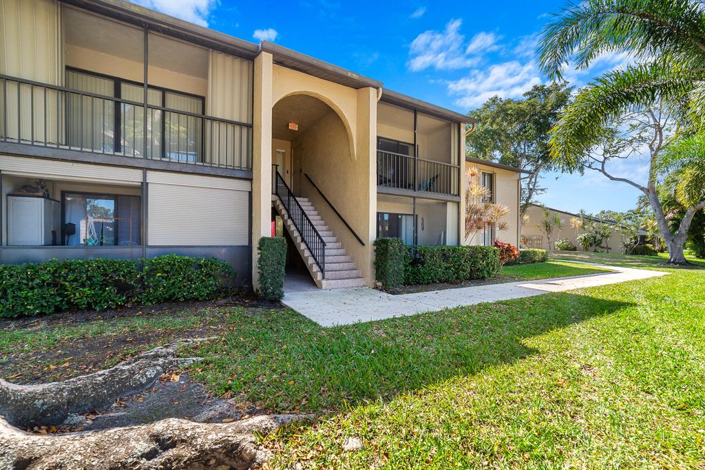 Photo of 702 Sunny Pine Way #Unit B1, Greenacres, FL 33415 (MLS # B26000705)